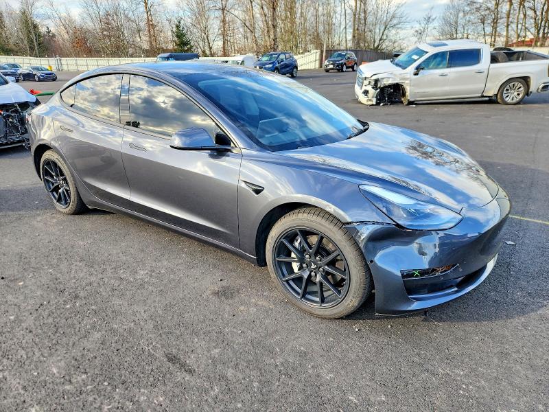 Photo 4 from auction – 2022 TESLA MODEL 3 with VIN 5YJ3E1EB9NF243622