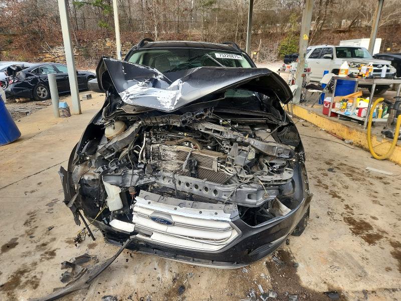 Photo 5 from auction – 2018 FORD ESCAPE with VIN 1FMCU0GD6JUD47025