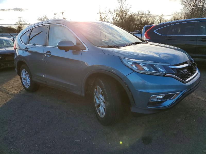 Photo 4 from auction – 2015 HONDA CR-V EXL with VIN 2HKRM4H70FH634201