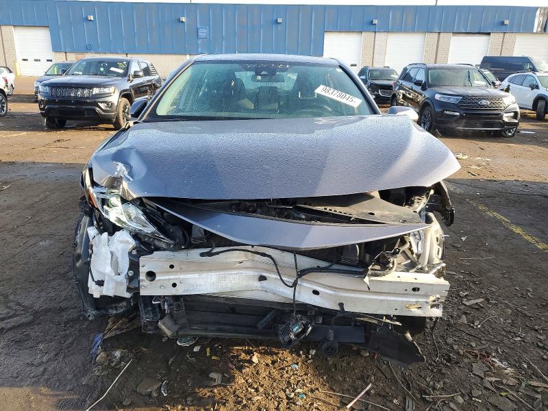 Photo 5 from auction – 2023 TOYOTA CAMRY with VIN 4T1C31AK4PU609892