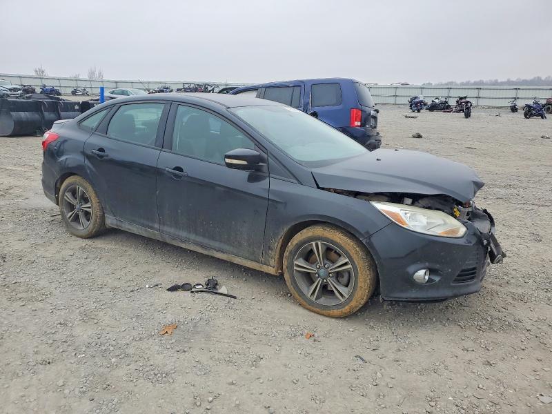 Photo 4 from auction – 2014 FORD FOCUS with VIN 1FADP3F26EL117245
