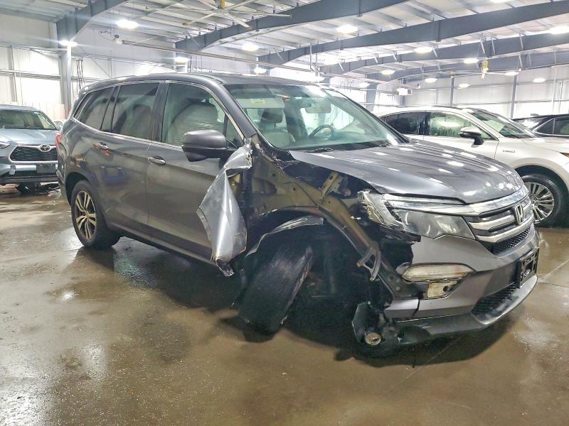 Photo 4 from auction – 2016 HONDA PILOT EXL with VIN 5FNYF6H84GB016292