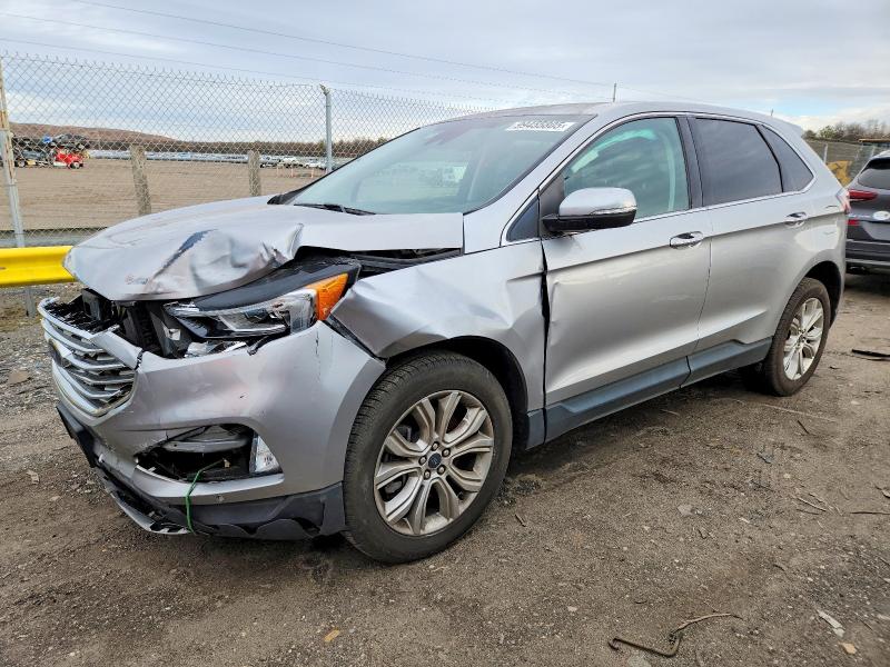 FORD EDGE TITAN 2022 with VIN 2FMPK4K97NBA32277 - Photo from auction