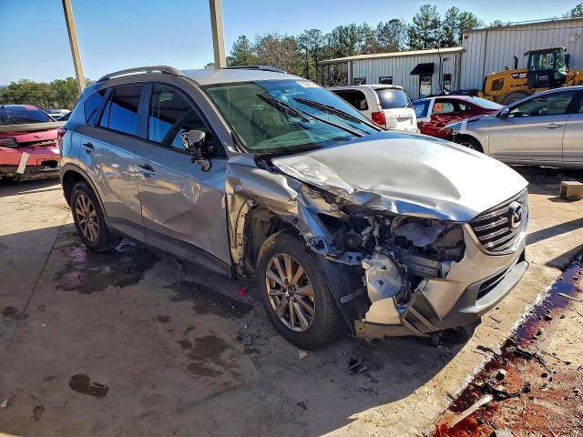 Photo 4 from auction – 2016 MAZDA CX-5 with VIN JM3KE2BY9G0645868