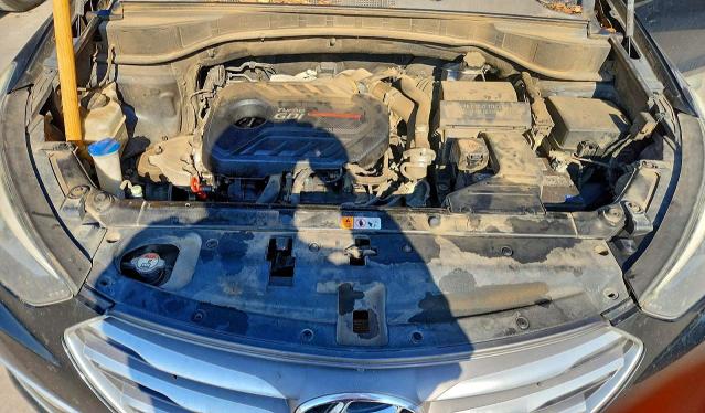 Photo 11 from auction – 2018 HYUNDAI SANTA FE S with VIN 5NMZU4LA6JH096337