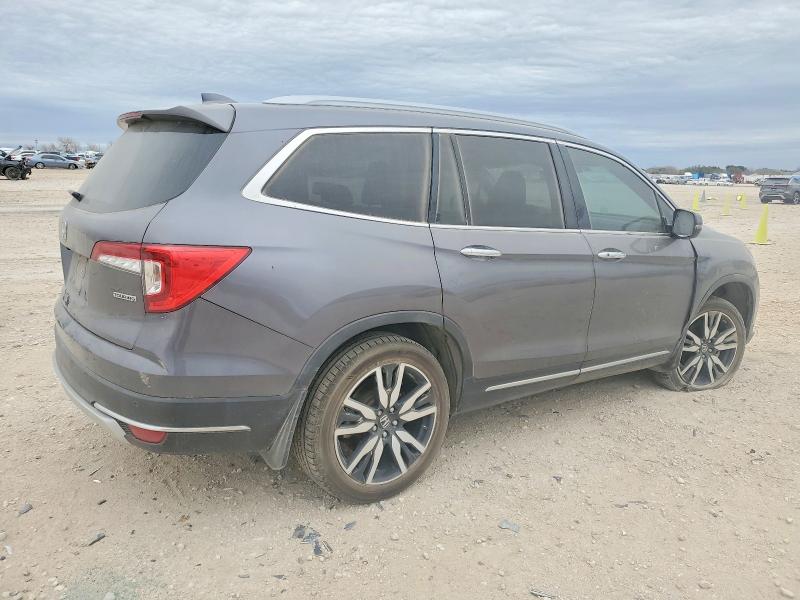 Photo 3 from auction – 2022 HONDA PILOT TOUR with VIN 5FNYF5H92NB006599