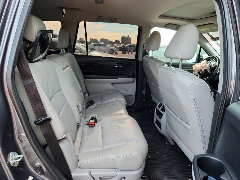 Photo 11 from auction – 2016 HONDA PILOT with VIN 5FNYF5H55GB014566