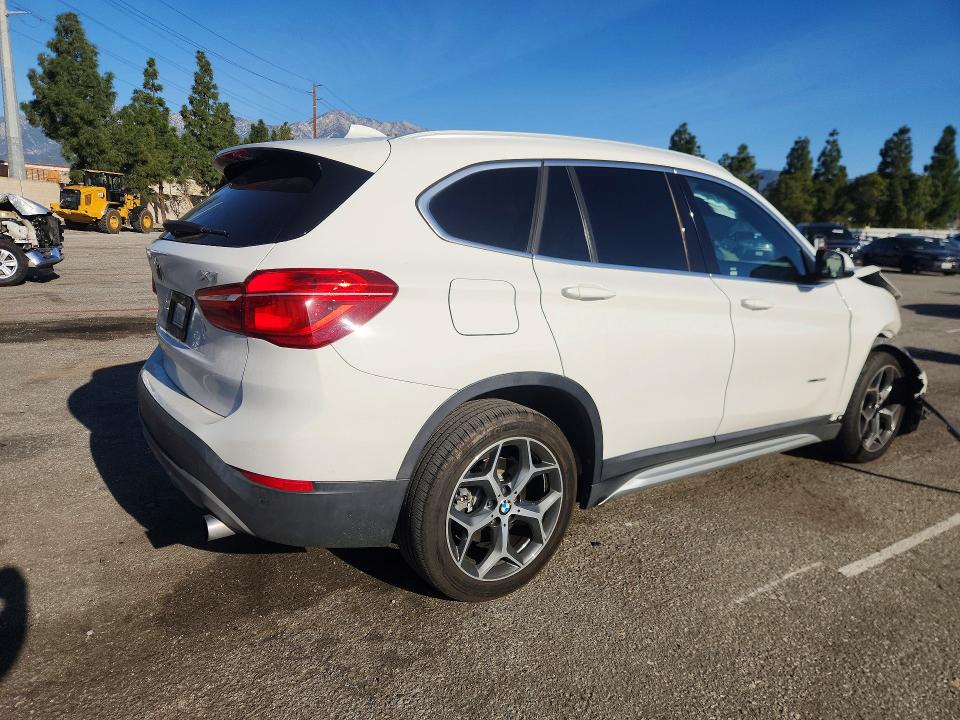Photo 3 from auction – 2017 BMW X1 with VIN WBXHU7C31H5H33362