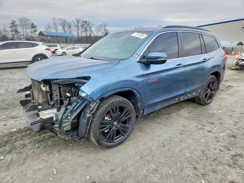 HONDA PILOT SE 2021 with VIN 5FNYF6H24MB064902 - Photo from auction