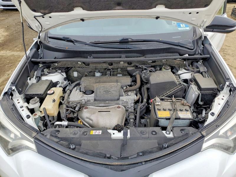 Photo 12 from auction – 2018 TOYOTA RAV4 SE with VIN JTMJFREV2JD241564