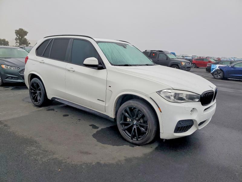 Photo 4 from auction – 2015 BMW X5 XDRIVE5 with VIN 5UXKR6C55F0J76624