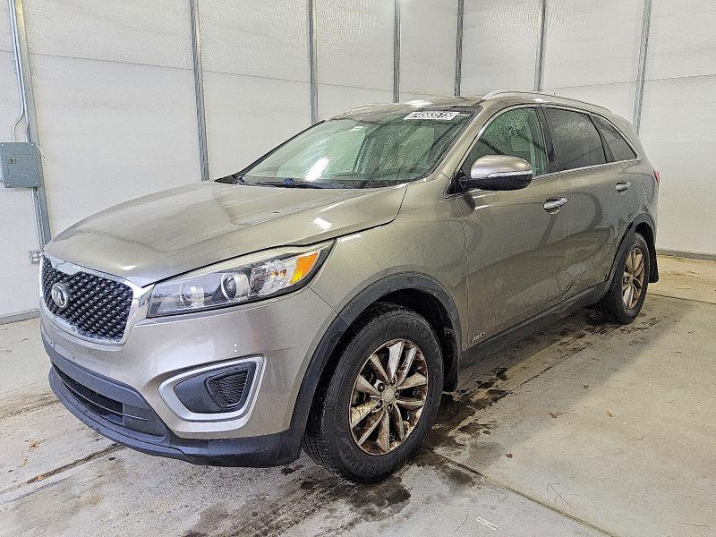 KIA SORENTO LX 2016 with VIN 5XYPGDA33GG151574 - Photo from auction