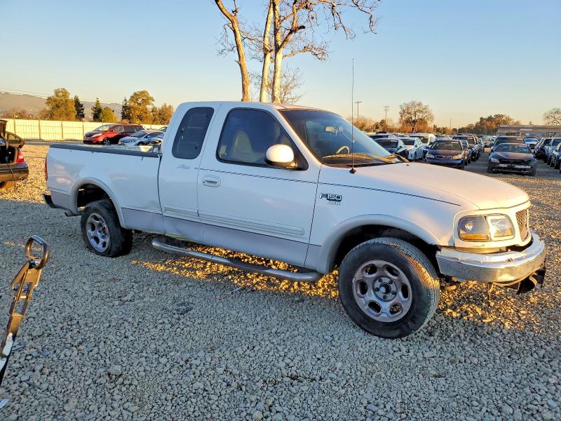 Photo 4 from auction – 2002 FORD F150 with VIN 1FTRX17L02NB12716