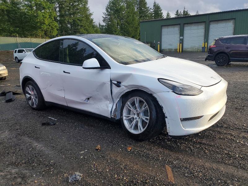 Photo 4 from auction – 2023 TESLA MODEL Y with VIN 7SAYGDEE1PF849966