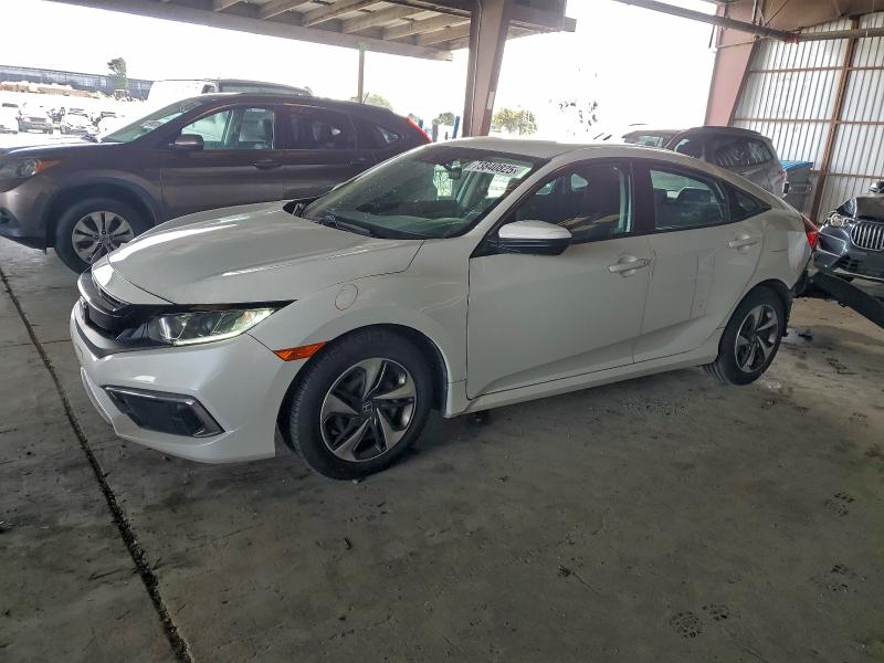 HONDA CIVIC LX 2019 with VIN 19XFC2F67KE017557 - Photo from auction