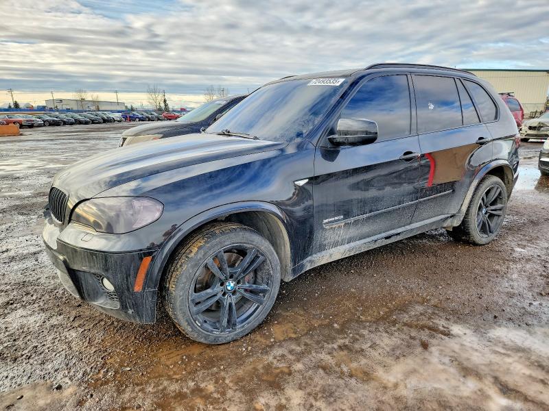 BMW X5 XDRIVE5 2011 with VIN 5UXZV8C5XBL418581 - Photo from auction