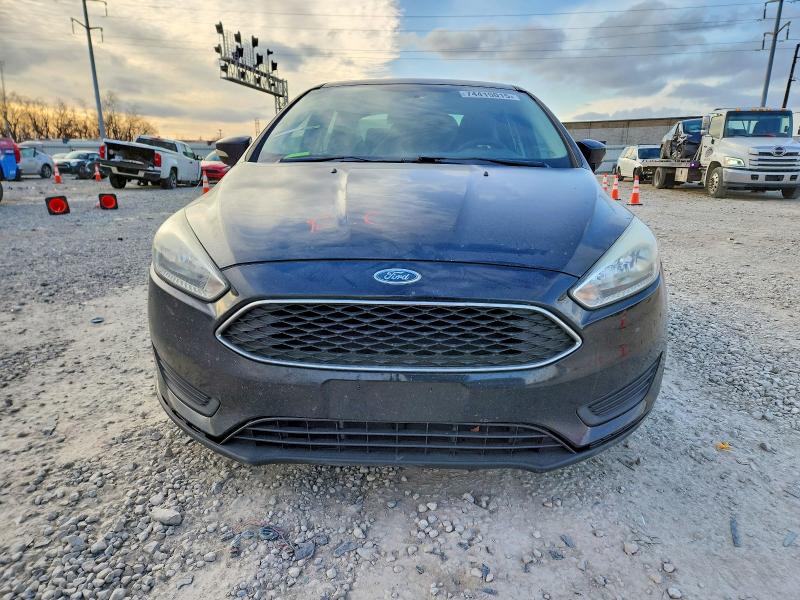 Photo 5 from auction – 2016 FORD FOCUS with VIN 1FADP3F20GL277737