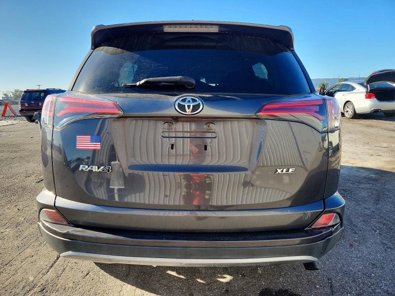 Photo 6 from auction – 2018 TOYOTA RAV4 with VIN 2T3WFREV8JW499144