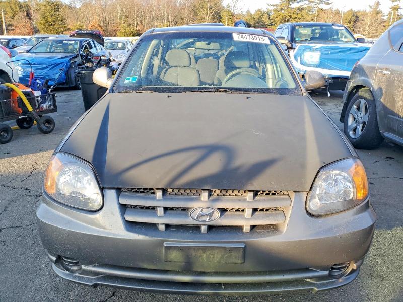 Photo 5 from auction – 2004 HYUNDAI ACCENT GL with VIN KMHCG45C14U513691