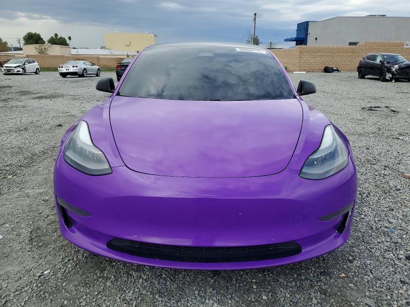 Photo 5 from auction – 2021 TESLA MODEL 3 with VIN 5YJ3E1EA5MF915939