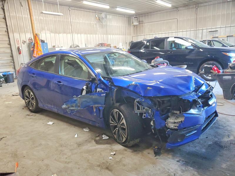 Photo 4 from auction – 2018 HONDA CIVIC EX with VIN JHMFC1F37JX043458