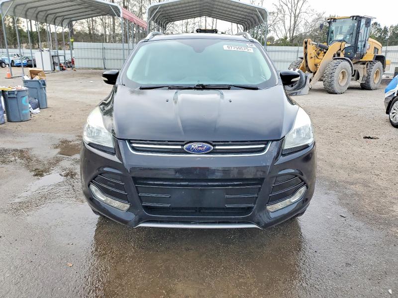 Photo 5 from auction – 2016 FORD ESCAPE TIT with VIN 1FMCU9JX9GUC22178