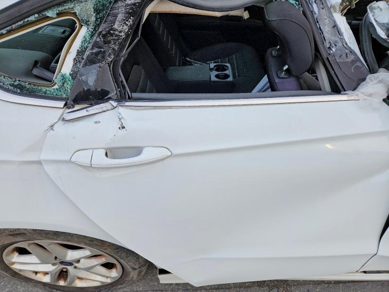 Photo 10 from auction – 2014 FORD FUSION with VIN 3FA6P0H76ER335803