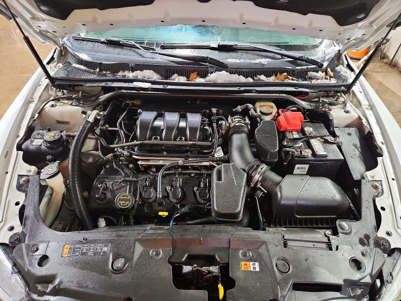 Photo 11 from auction – 2015 FORD TAURUS SE with VIN 1FAHP2D84FG170216