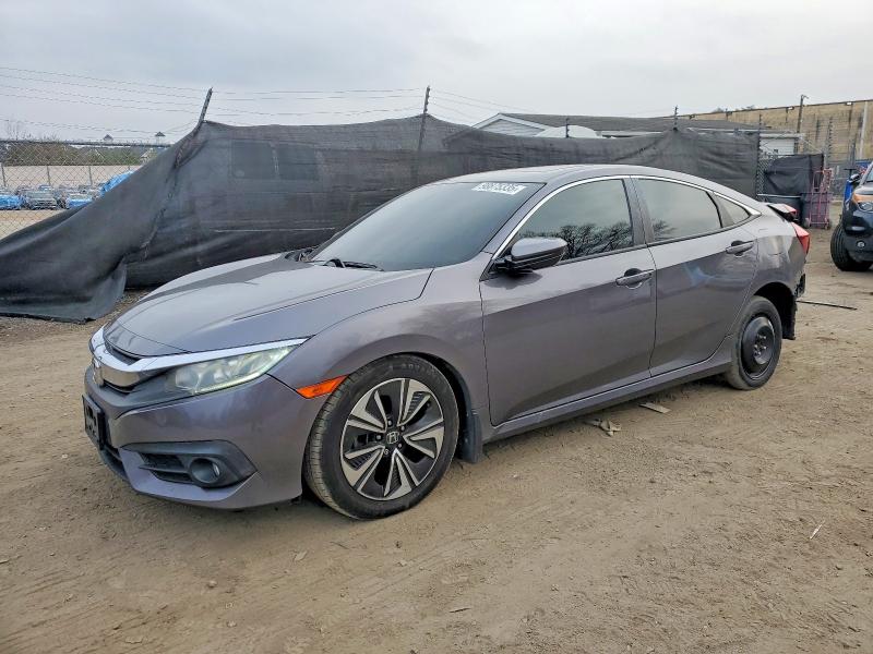HONDA CIVIC 2016 with VIN 2HGFC1F30GH634425 - Photo from auction