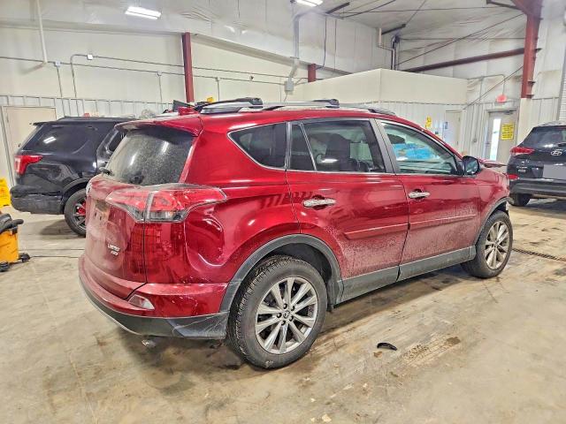 Photo 3 from auction – 2018 TOYOTA RAV4 LIMIT with VIN 2T3DFREV1JW744759