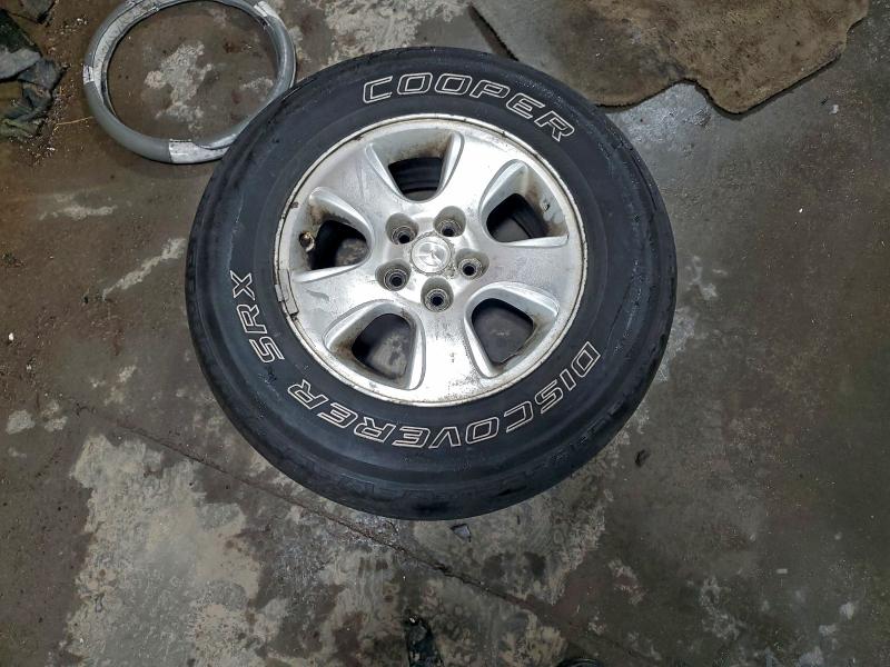 Photo 12 from auction – 2001 MAZDA TRIBUTE DX with VIN 4F2YU06171KM60267