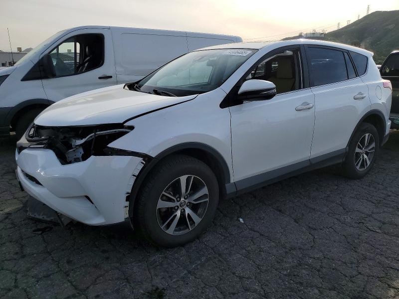 TOYOTA RAV4 XLE 2017 with VIN JTMWFREV0HD105157 - Photo from auction
