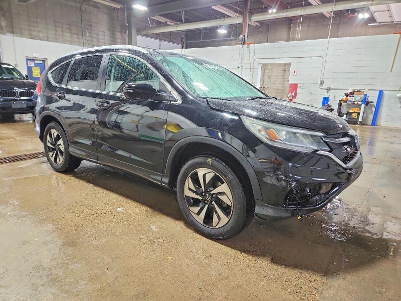 Foto 4 de la subasta – 2015 HONDA CR-V con VIN 5J6RM4H97FL065337