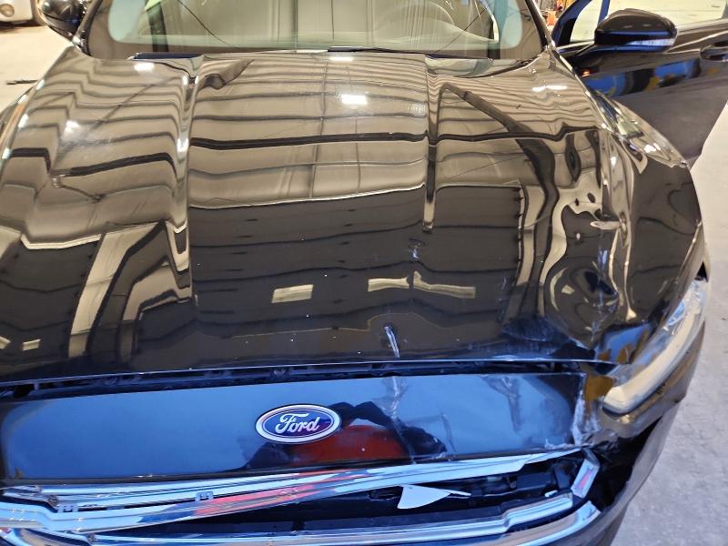 Photo 11 from auction – 2016 FORD FUSION SE with VIN 3FA6P0HD1GR252966