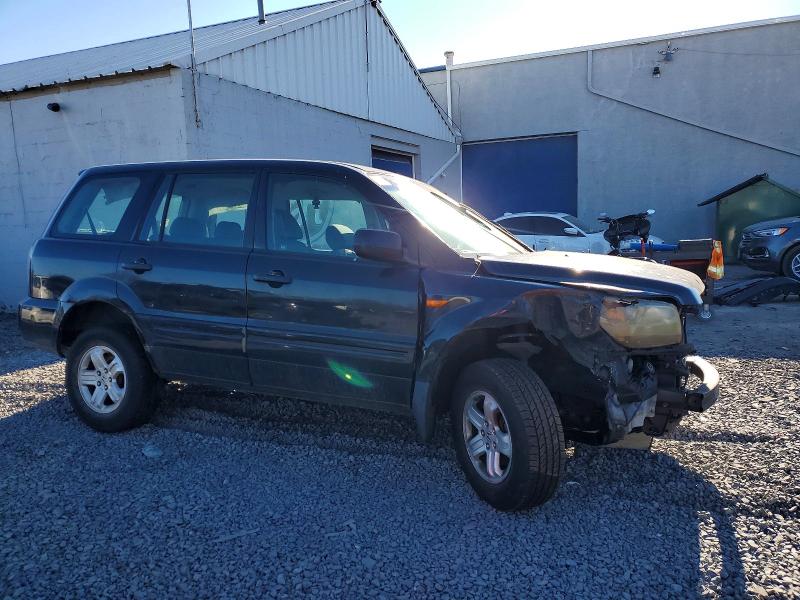 Photo 4 from auction – 2006 HONDA PILOT LX with VIN 2HKYF18156H559303