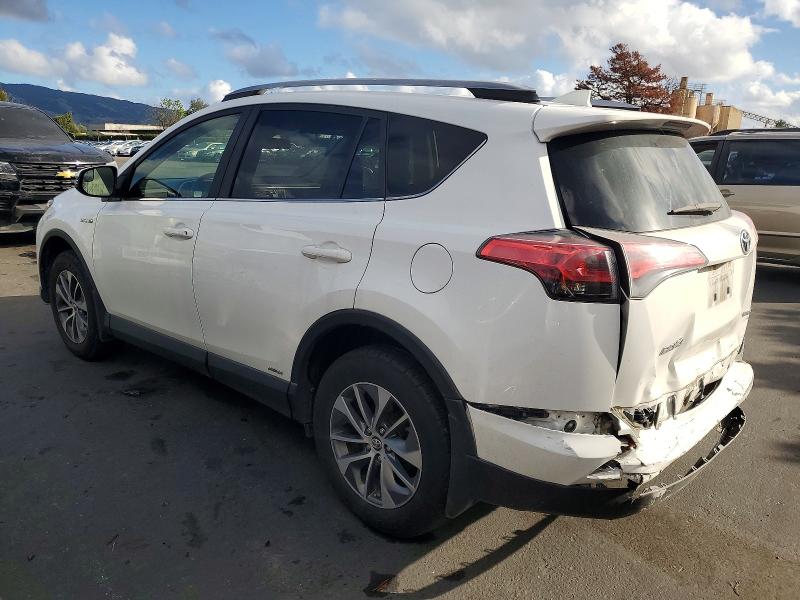 Photo 2 from auction – 2018 TOYOTA RAV4 HV LE with VIN JTMRJREV4JD228106
