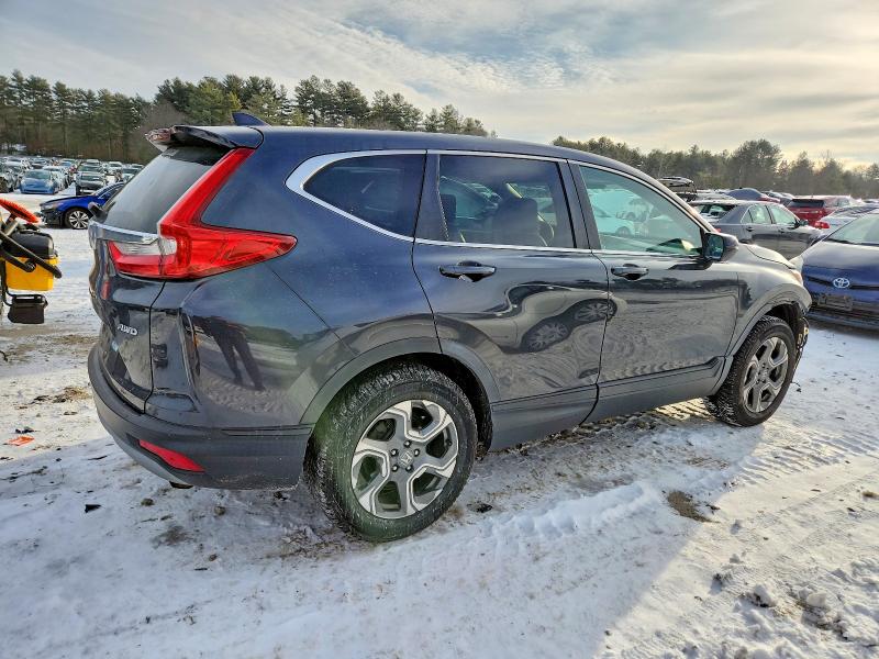 Photo 3 from auction – 2017 HONDA CR-V with VIN 5J6RW2H8XHL024550