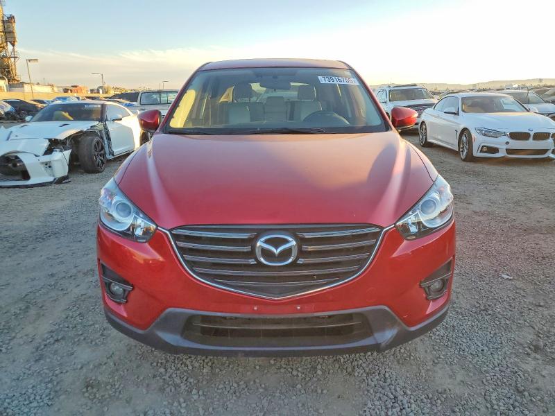 Photo 5 from auction – 2016 MAZDA CX-5 GT with VIN JM3KE2DY0G0773459