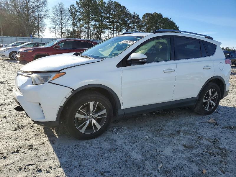 TOYOTA RAV4 XLE 2017 with VIN JTMRFREV6HJ703896 - Photo from auction