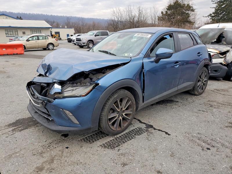 MAZDA CX-3 TOURI 2018 with VIN JM1DKFC70J0307919 - Photo from auction