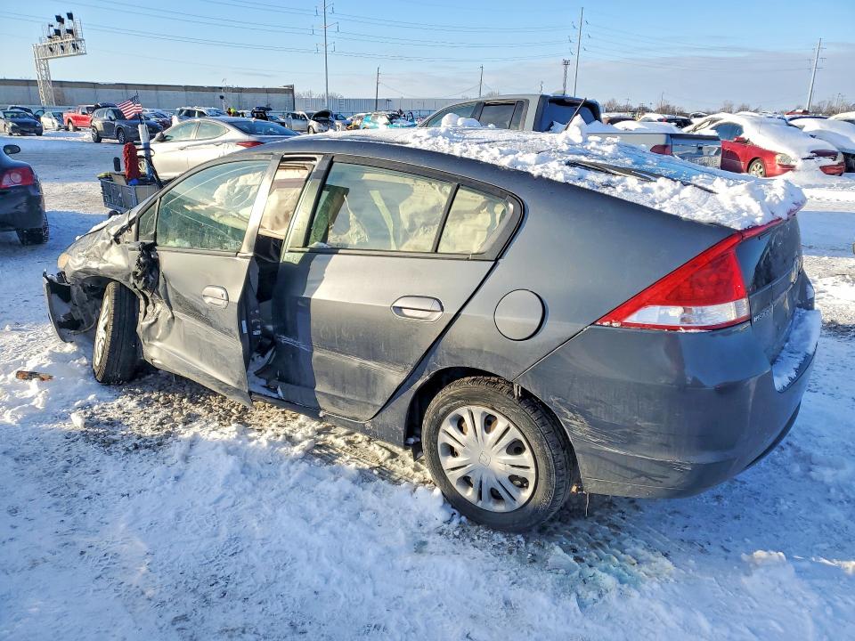 Photo 2 from auction – 2010 HONDA INSIGHT with VIN JHMZE2H52AS026740