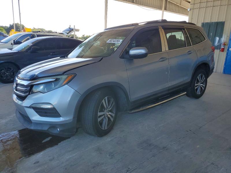 HONDA PILOT 2017 with VIN 5FNYF5H57HB006034 - Photo from auction