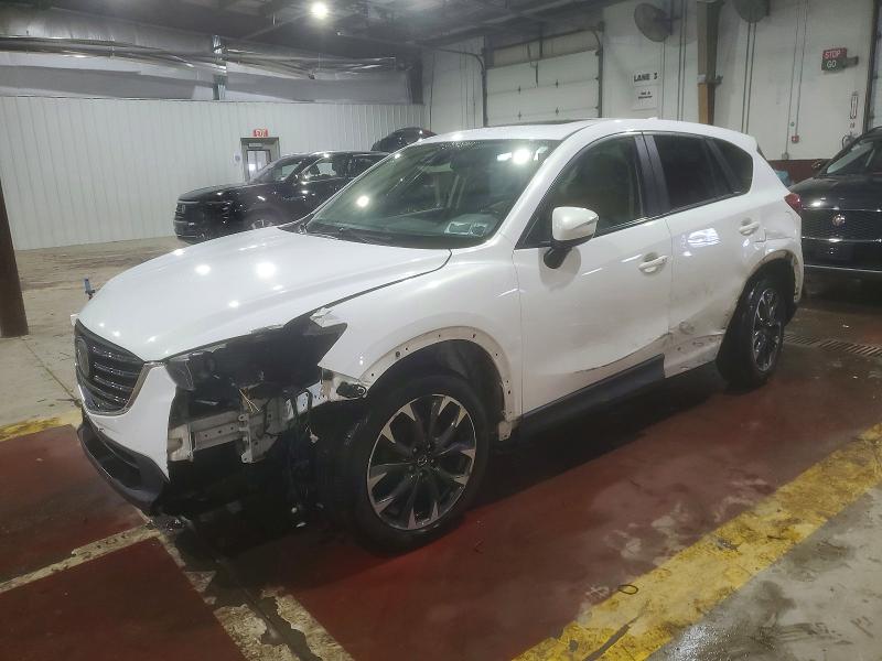MAZDA CX-5 2016 with VIN JM3KE4DY2G0749711 - Photo from auction