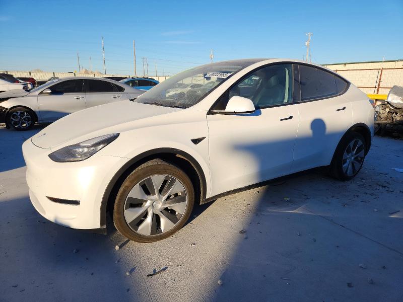TESLA MODEL Y 2023 with VIN 7SAYGDEE0PA092801 - Photo from auction