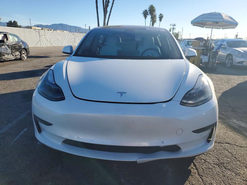 Photo 5 from auction – 2022 TESLA MODEL 3 with VIN 5YJ3E1EA8NF321024