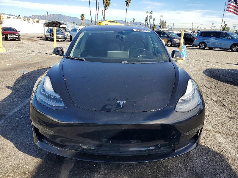 Photo 5 from auction – 2019 TESLA MODEL 3 with VIN 5YJ3E1EA6KF310695