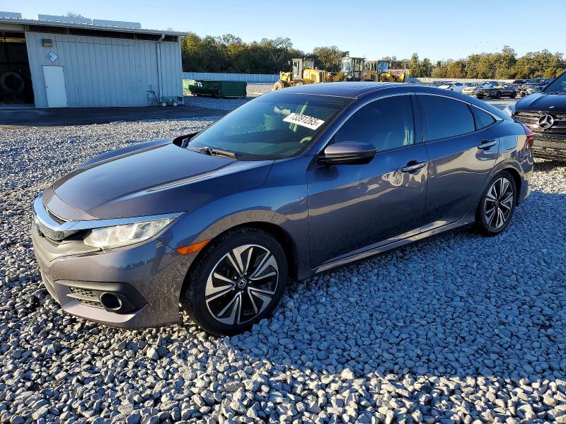 HONDA CIVIC EX 2017 with VIN 2HGFC1F38HH648414 - Photo from auction