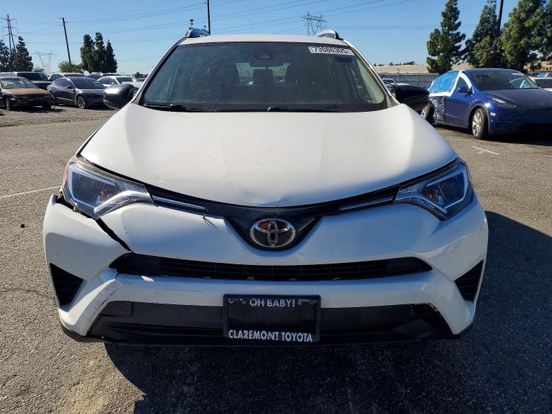 Photo 5 from auction – 2017 TOYOTA RAV4 LE with VIN JTMZFREV9HJ137829