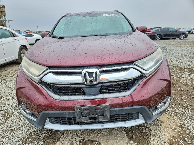 Photo 5 from auction – 2017 HONDA CR-V TOURI with VIN 5J6RW1H95HL001079