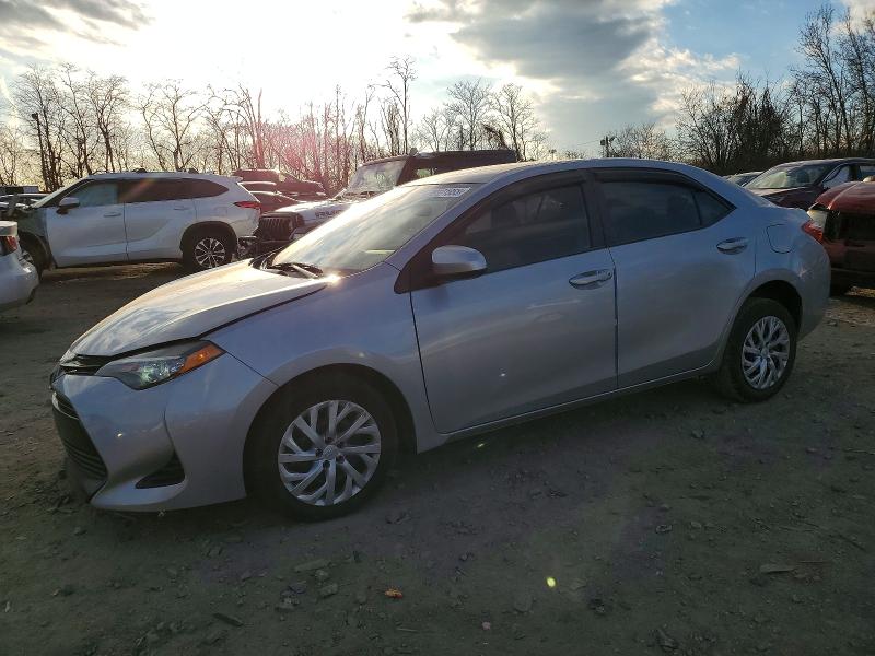 TOYOTA COROLLA 2017 with VIN 5YFBURHE0HP660848 - Photo from auction